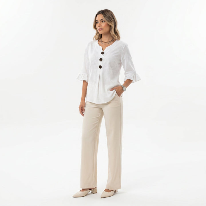 Blusa Sofía de algodón-lino lisa con botones de madera y volantes