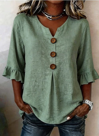 Blusa Sofía de algodón-lino lisa con botones de madera y volantes