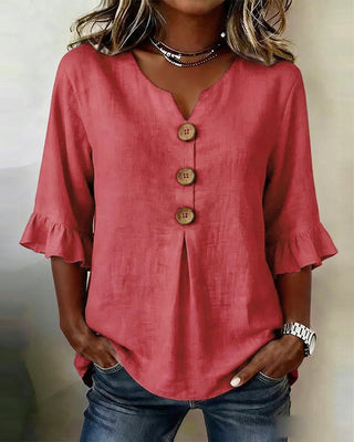 Blusa Sofía de algodón-lino lisa con botones de madera y volantes